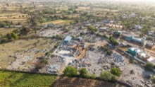 Wide aerial of the processing and storage yard