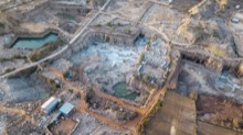 Dusk settling over a stepped quarry basin