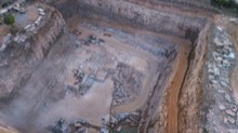 Late evening light over the rectangular extraction pit