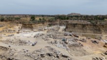Fresh morning light on the quarry face and staging area