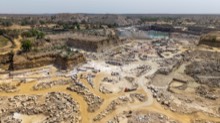Broad overview of the open quarry basin in daylight