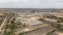 Wide landscape of the quarry belt and access roads