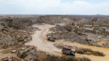 Haul trucks moving through the quarry road network