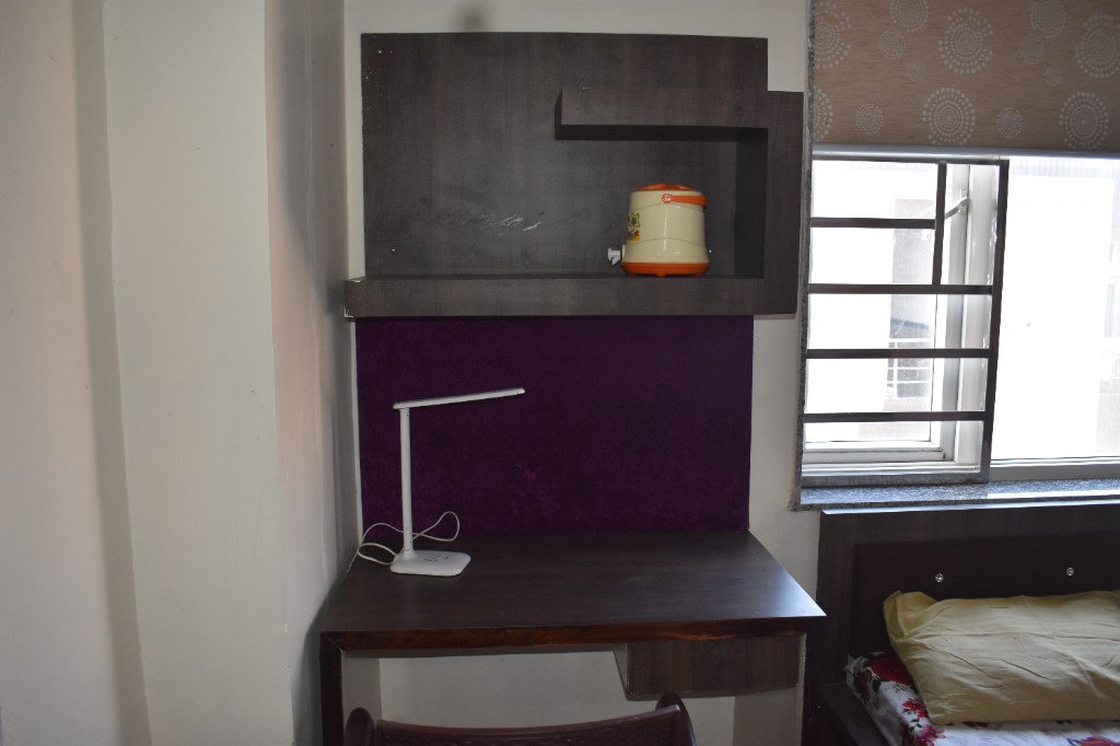 Study area with desk and storage