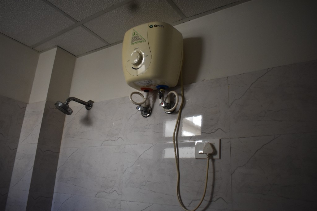 Water heater and shower